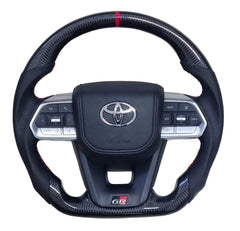 Toyota VX300 GR Full Carbon Silver Trim Red Stitch Steering Wheel