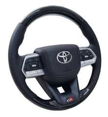 Toyota VX300 GR Piano Black Steering Wheel Silver Trim Black Leather