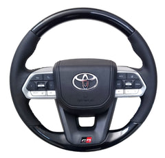 Toyota VX300 GR Piano Black Steering Wheel Silver Trim Black Leather